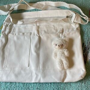 Cute zippered tote bag with teddy bear charm and 4 pockets